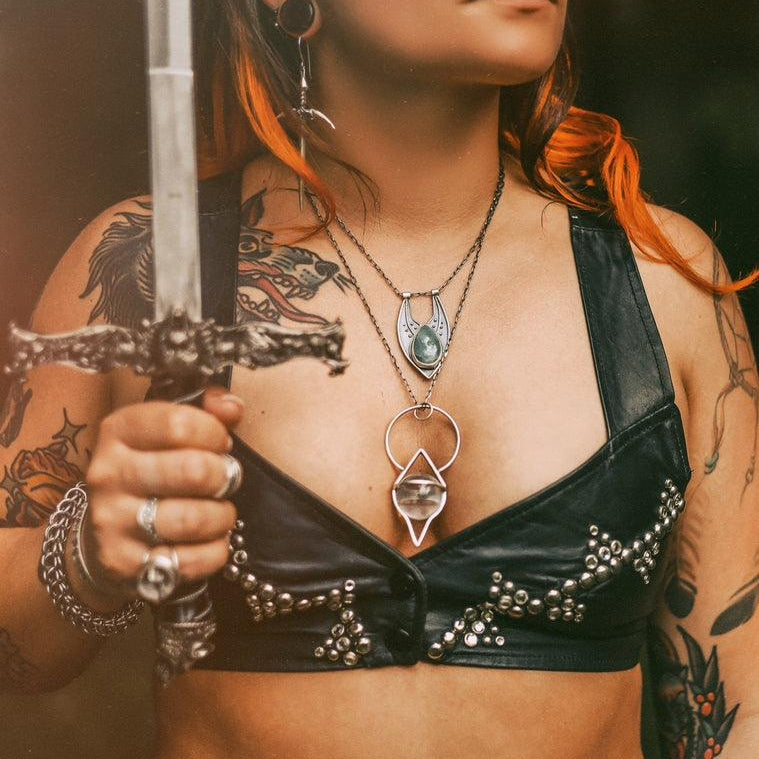 The Crystal Ball Pendulum Necklace: A Modern Tool for Ancient Magic