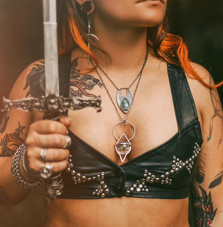 The Crystal Ball Pendulum Necklace: A Modern Tool for Ancient Magic